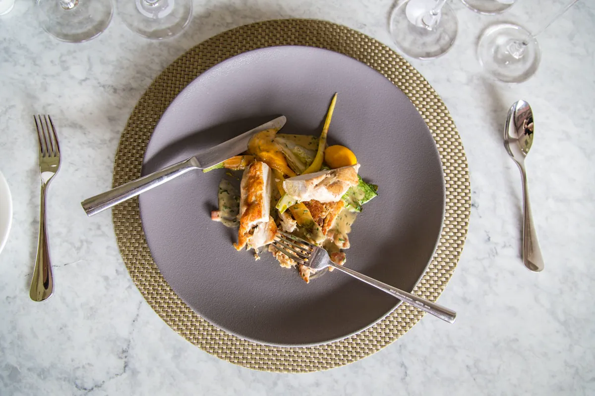 Arctic char dressed at the pass in a shallow bowl